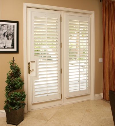 French back door with white plantation shutters